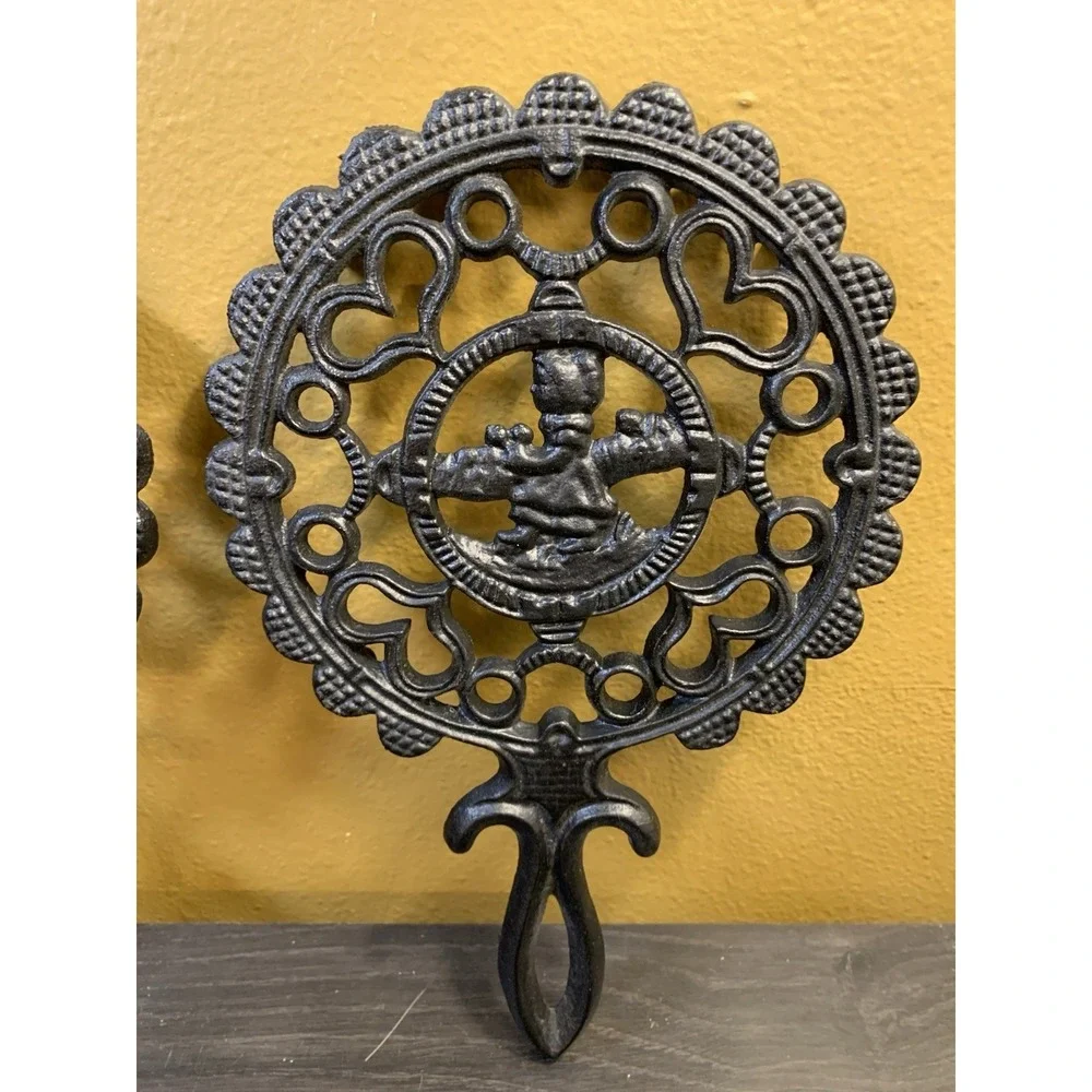 Two Fancy Vintage Cast Iron Trivets Black J.Z.H Amish Boy Girl 1952